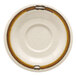 A white saucer with a brown border and yellow design.