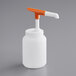 A white plastic jug with an orange and white Choice pump.