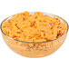 A glass bowl of Price's Pimento Cheese Spread on a table in a deli.