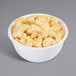 A bowl of Kraft white cheddar macaroni and cheese.
