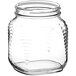 A 30.5 oz. clear glass square honey jar with a lid.
