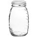 A 5.5 oz. clear glass Classic Queenline honey jar with a lid.