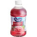 A close-up of a red Ocean Spray Cranberry Juice bottle.