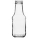 A clear glass BBQ sauce bottle with a white cap.