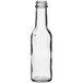 A 5 oz. clear glass Woozy bottle with a black cap.