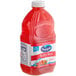 A bottle of Ocean Spray Ruby Red Grapefruit Juice with a white label containing red liquid.