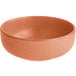 A close up of an Acopa Terra Cotta Matte Nappie Bowl with a brown rim.