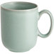 A close-up of an Acopa Harbor Blue Matte mug with a handle.