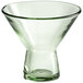 A close-up of an Acopa Pangea green martini glass with a clear bottom and rim.