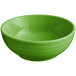 A palm green stoneware bistro bowl with a white interior.