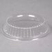 A clear plastic dome lid on a clear plastic bowl.