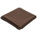 A folded brown cloth on a white background.