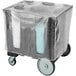 A black Cambro dish caddy with a clear vinyl cover on a cart.