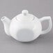 An Acopa bright white porcelain teapot on a gray surface.