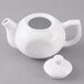 An Acopa bright white porcelain teapot with a lid.