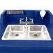 A navy blue Cambro CamKiosk portable hand sink with two sinks and two faucets.