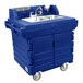 A navy blue plastic Cambro CamKiosk portable self-contained hand sink cart with two sinks.