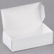 A white 1/2 lb. Valentine's Day candy box with an open lid.