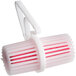 A white and red plastic Lavex toilet rim cage with a handle and a pink top.