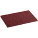 A maroon Lavex scouring pad.