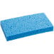 A Lavex blue cellulose sponge on a counter.