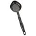 A black plastic Vollrath High Heat Perforated Oval Spoodle with a handle.