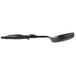 A black Vollrath High Heat Perforated Oval Nylon Spoodle with a handle.