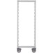 A white metal rectangular frame with wheels.