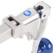 A metal Edlund can opener clamp with blue accents.