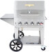 A Crown Verity stainless steel portable outdoor BBQ grill on a cart.
