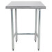 A stainless steel Advance Tabco work table with a square top and metal base.
