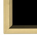 A close-up of a black and gold frame with a black marker board inside.