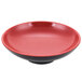 A red melamine bowl with a black rim.