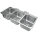 A stainless steel Advance Tabco drop-in sink with three bowls and faucets.