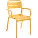 A pack of 4 yellow Grosfillex outdoor armchairs with armrests.