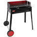 An Omcan black and red steel charcoal grill with wheels.