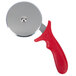 An American Metalcraft stainless steel pizza cutter with a red handle.