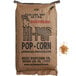 A brown bag of Reist HI-POP Mushroom Popcorn Kernels with the words "HI-POP" on it.