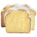 Slices of Sweet Sam's iced lemon pound cake with white frosting.