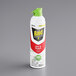 A white and green SC Johnson Raid Essentials spray can.