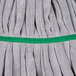 A close up of a Unger SmartColor green and gray microfiber tube mop head.