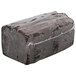 A brick of Sweet Sam's double chocolate pound cake wrapped in plastic.