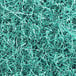 Spring-Fill teal crinkle cut paper shred. A close-up of shredded paper.