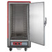 A red Metro C5 heated holding cabinet with a solid door open.