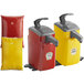 Two red and yellow Heinz countertop pump dispensers with yellow and red Heinz pouches.