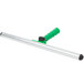 An Unger SwivelStrip T-Bar window washer handle with green and silver accents.