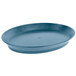 A blue HS Inc. oval deli server with a short base on a table.