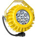 An Ideal Warehouse yellow LED dock light with a black cord.