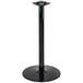 A Lancaster Table & Seating black cast iron bar height table base with a round base and pole.
