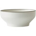 A close-up of a white Oneida Moira stoneware bowl with a grey rim.